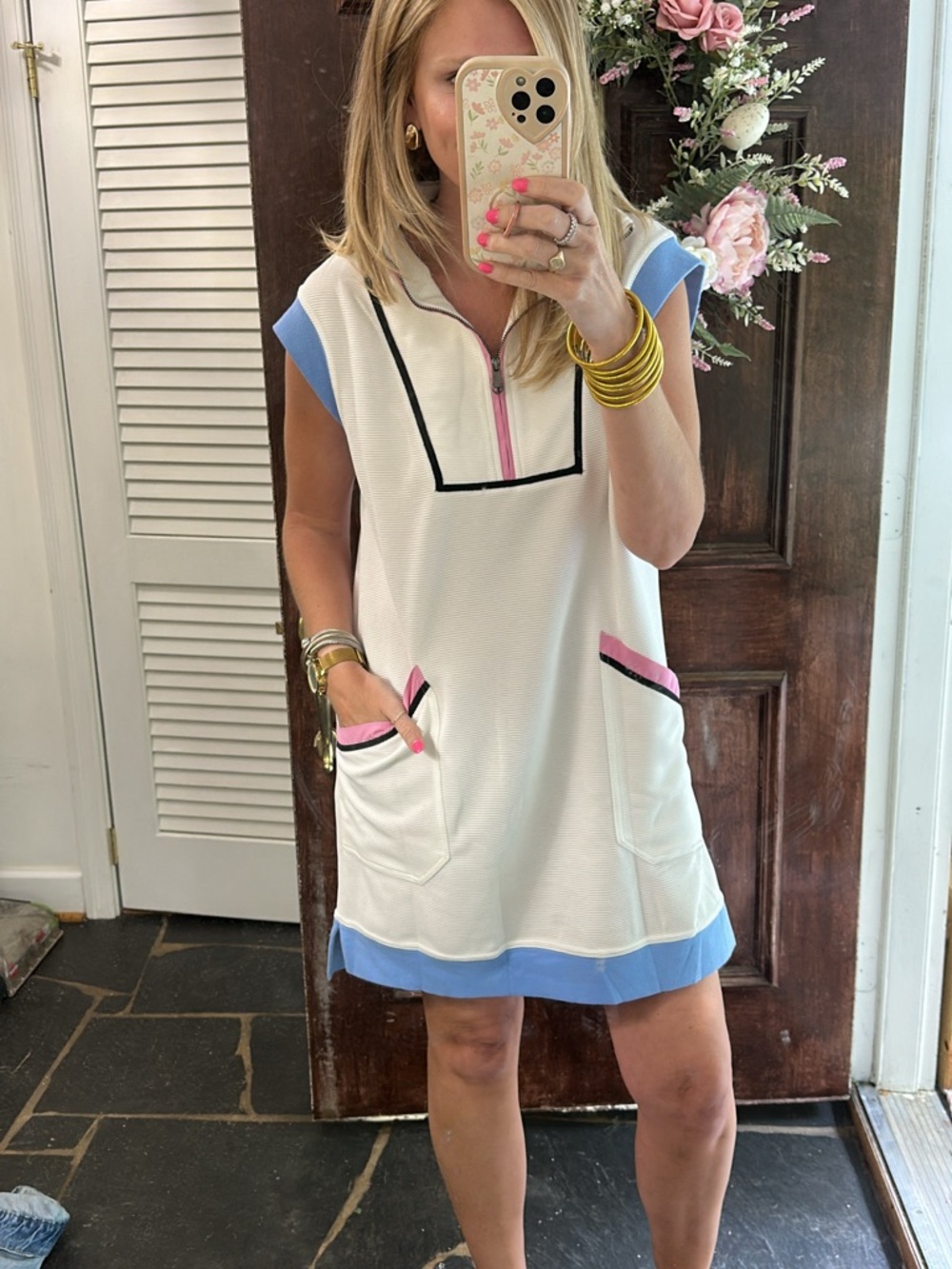 Amazon White Mini Dress with Blue Trim and Pink Accents